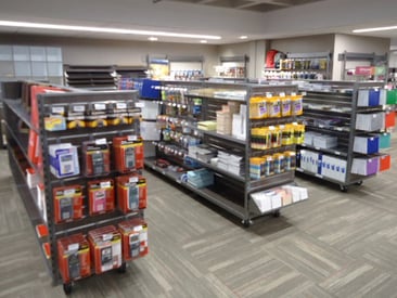 Store displaying slatwall fixtures with school supplies
