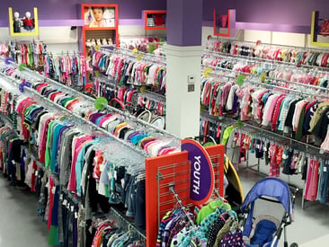 Store displays double high rows of children's clothing